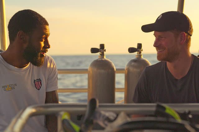 <p>Courtesy of Netflix</p> Cameras captured Gabriel George and Prince Harry's scuba diving adventure for Heart of Invictus, now streaming on Netflix.