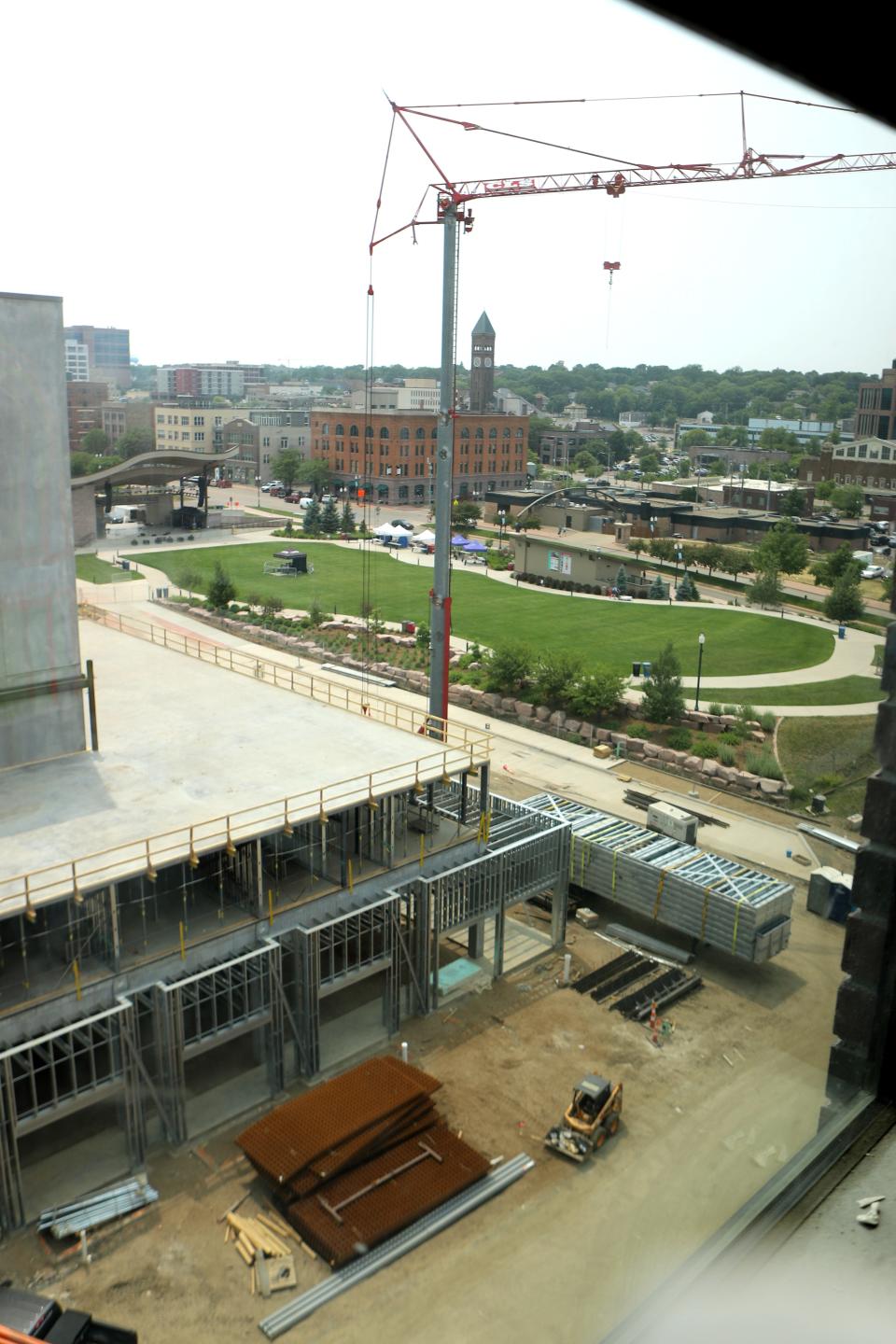 The Steel District office tower overlooks the parking ramp/wrap building and the Levitt at the Falls green southwest on Friday, June 16.