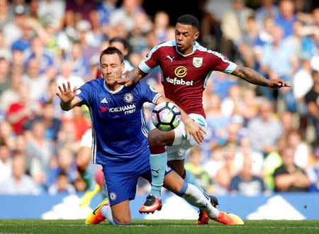 Football Soccer Britain - Chelsea v Burnley - Premier League - Stamford Bridge - 27/8/16 Burnley's Andre Gray in action with Chelsea's John Terry Action Images via Reuters / Andrew Couldridge Livepic