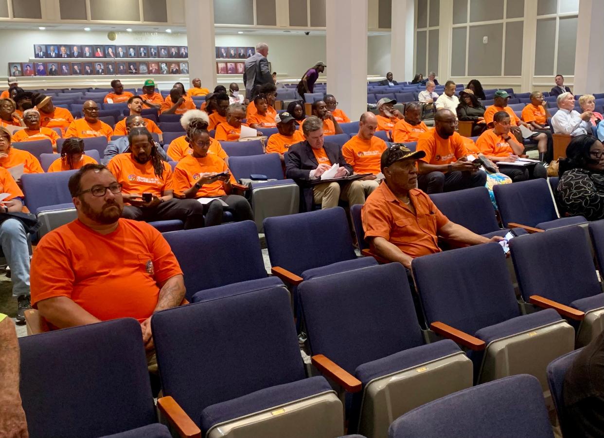 Members of the North Florida Central Labor Council and supporters of the Eastside neighborhood both wore orange shirts for their respective messages when they turned out for a public hearing Monday, June 17, 2024, at Jacksonville City Hall on the proposed stadium agreement between the city and Jaguars.