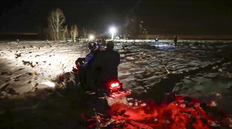 <p>In this photo provided by the Russian Emergency Situations Ministry, RMES employees work at the scene of a AN-148 plane crash in Stepanovskoye village, about 40 kilometers (25 miles) from the Domodedovo airport, Russia, Feb. 11, 2018. (Photo: Russian Ministry for Emergency Situations photo via AP) </p>