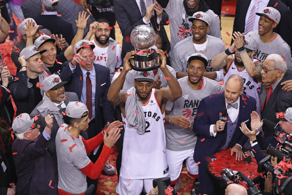 Kawhi Leonard #2 of the Toronto Raptors hoists the Eastern Conference Championship trophy after defeating the Milwaukee Bucks in the NBA Eastern Conference Final at Scotiabank Arena on May 25, 2019 in Toronto. (Photo by Claus Andersen/Getty Images)