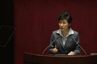 South Korean President Park Geun-hye delivers her speech on 2015's budget bill during a plenary session at the National Assembly in Seoul October 29, 2014. REUTERS/Kim Hong-Ji
