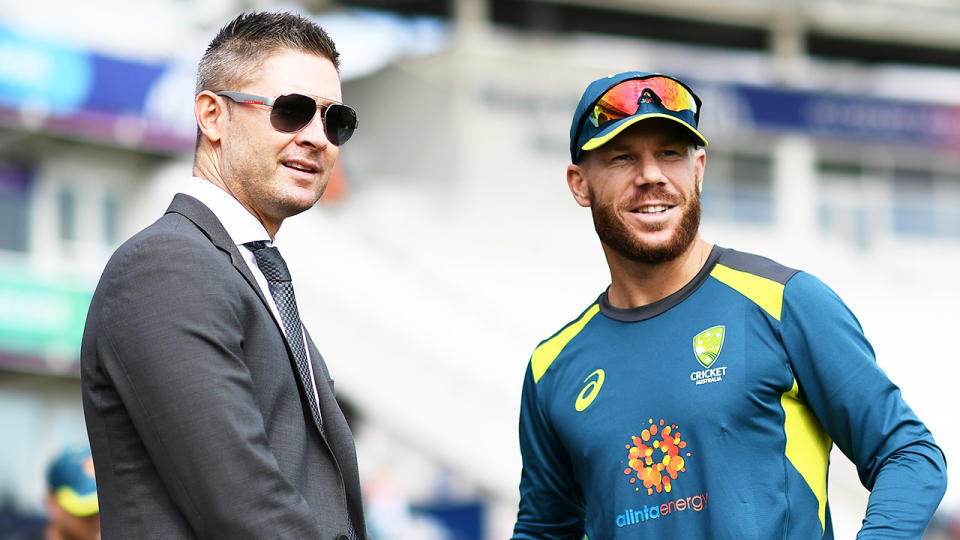 Michael Clarke (pictured left) talking to batsman David Warner (pictured right) before a match.