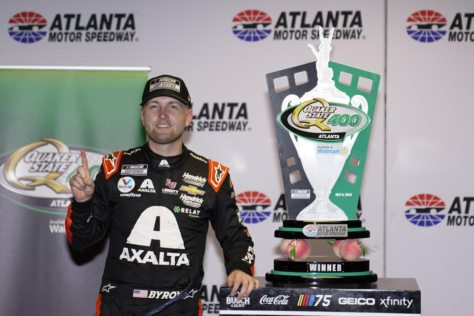 William Byron celebrates in victory lane after winning a NASCAR Cup Series auto race at Atlanta Motor Speedway on Sunday, July 9, 2023, in Hampton, Ga. (AP Photo/Brynn Anderson)