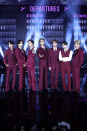 <p>BTS all wore crimson, with each member putting their own unique spin on the suit.</p>