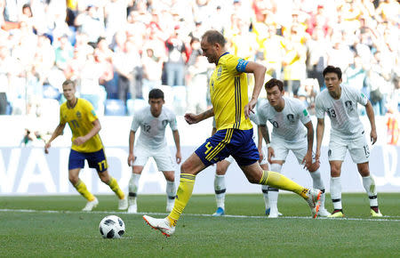 Soccer Football - World Cup - Group F - Sweden vs South Korea - Nizhny Novgorod Stadium, Nizhny Novgorod, Russia - June 18, 2018 Sweden's Andreas Granqvist scores their first goal from the penalty spot REUTERS/Matthew Childs