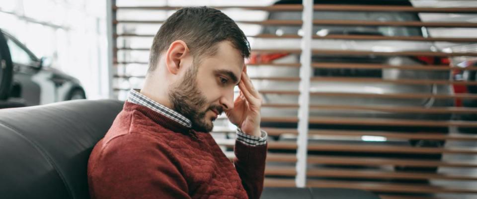 Sad guy at dealership