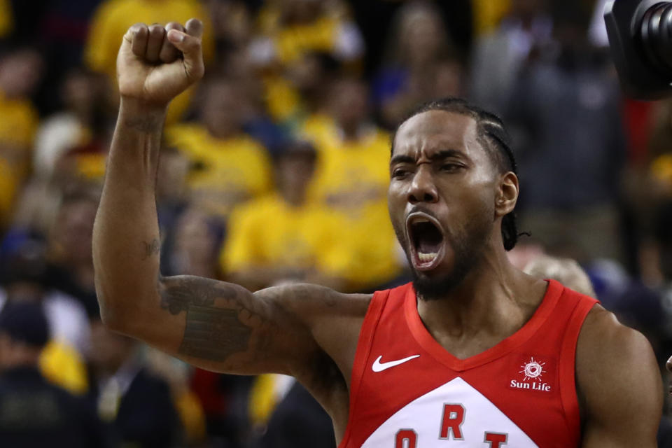 OAKLAND, CALIFORNIA - JUNE 13:  Kawhi Leonard #2 of the Toronto Raptors celebrates his teams win over the Golden State Warriors in Game Six to win the 2019 NBA Finals at ORACLE Arena on June 13, 2019 in Oakland, California. NOTE TO USER: User expressly acknowledges and agrees that, by downloading and or using this photograph, User is consenting to the terms and conditions of the Getty Images License Agreement. (Photo by Ezra Shaw/Getty Images)