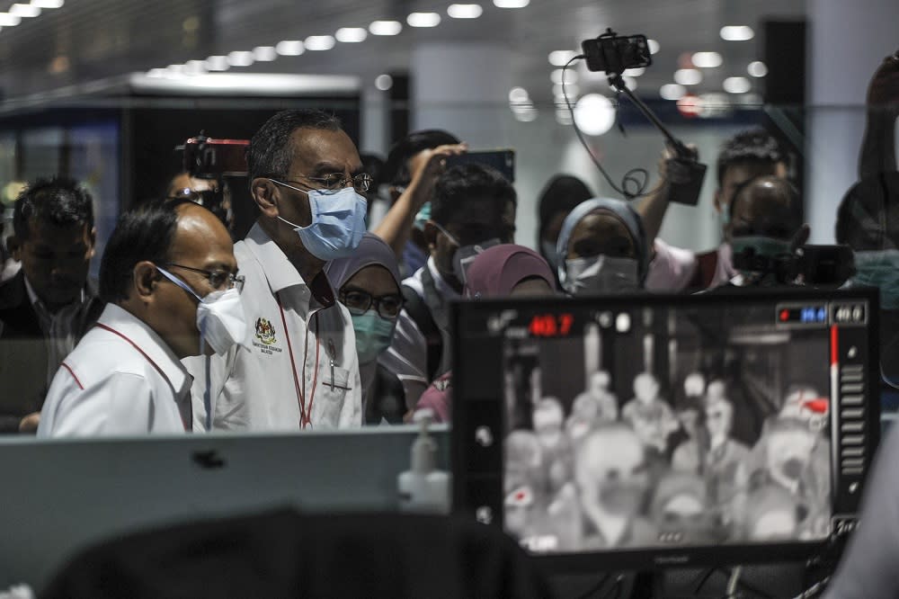 Health Minister Datuk Seri Dzulkefly Ahmad (centre) at one of the thermal screening point located at the Kuala Lumpur International Airport in Sepang January 27, 2020. — Picture by Shafwan Zaidon