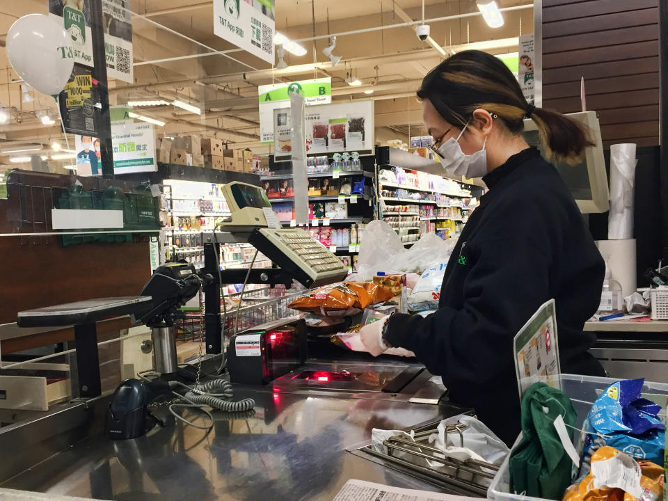 Cashier at a grocery store in Toronto, Ontario, Canada on November 17, 2021. Consumer prices in Canada are rising at their fastest annual pace in almost 20 years. Canada's inflation rate jumped to a new 18-year high of 4.7 per cent last month, led by sharply higher prices for energy. (Photo by Creative Touch Imaging Ltd./NurPhoto via Getty Images)