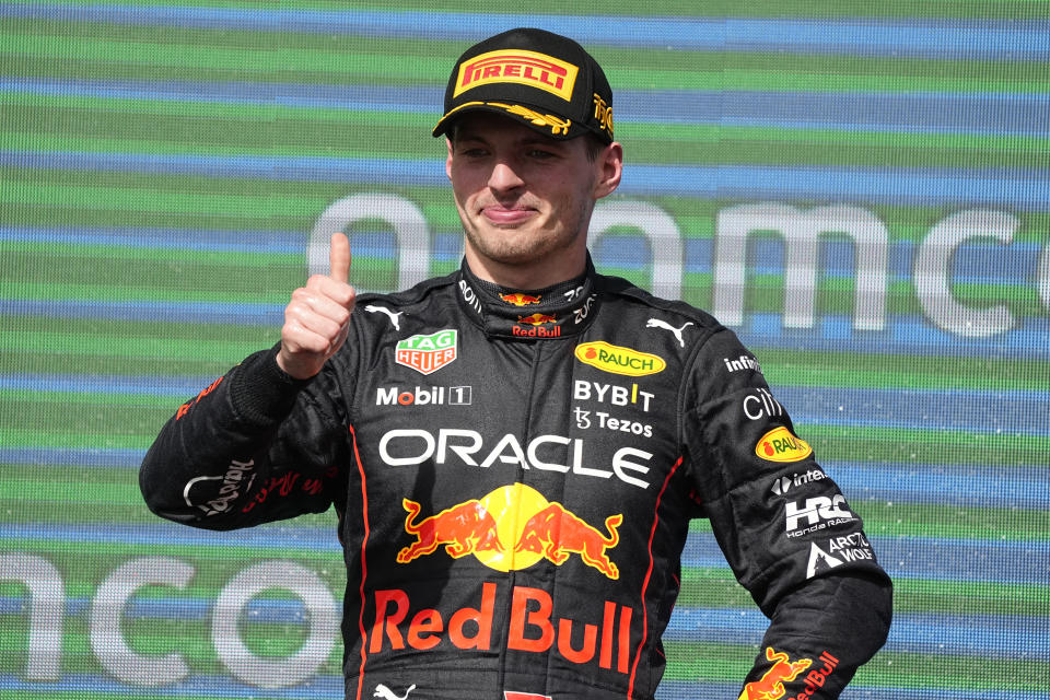 Red Bull driver Max Verstappen, of the Netherlands, celebrates on the podium after winning the Formula One U.S. Grand Prix auto race at Circuit of the Americas, Sunday, Oct. 23, 2022, in Austin, Texas. (AP Photo/Charlie Neibergall)