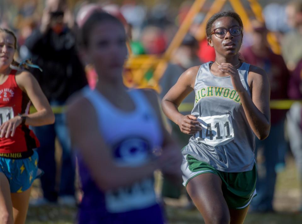 Richwoods' Darielle Saintilus finishes 25th in the Class 2A girls cross-country sectional Saturday, Oct. 29, 2022 at Black Partridge Park in Metamora.