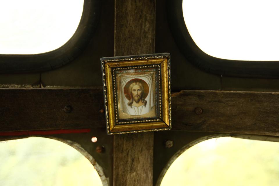 An icon of Jesus is seen inside a cable car in the town of Chiatura