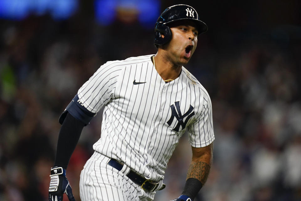 New York Yankees' Aaron Hicks runs the bases after hitting a three-run home run during the ninth inning of the team's baseball game against the Houston Astros on Thursday, June 23, 2022, in New York. (AP Photo/Frank Franklin II)