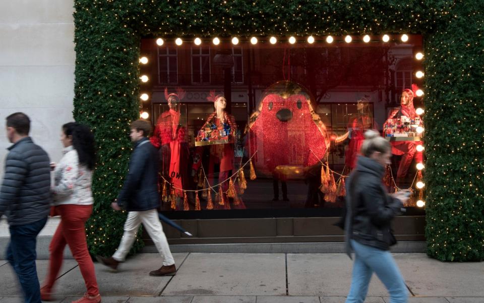 Shoppers walk past Selfridges department store on Oxford Street - Geoff Pugh for the Telegraph