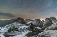 <p>A lone stargazer sits atop the peak of Castell-Y-Gwynt on Glyder Fach Mountain in Snowdonia, North Wales, beneath a starry night sky during freezing temperatures in mid-winter. (Pic: Kris Williams) </p>