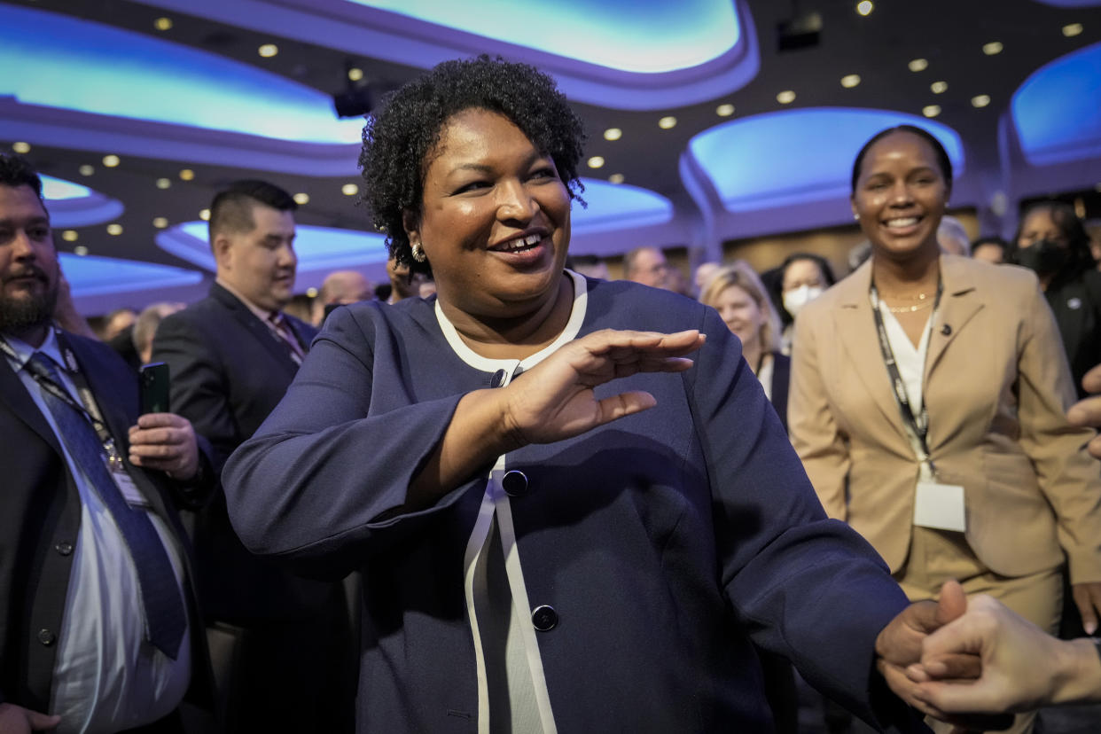 Georgia Democratic gubernatorial candidate Stacey Abrams arrives to speak a conference in Washington on April 6, 2022. (Drew Angerer / Getty Images file)