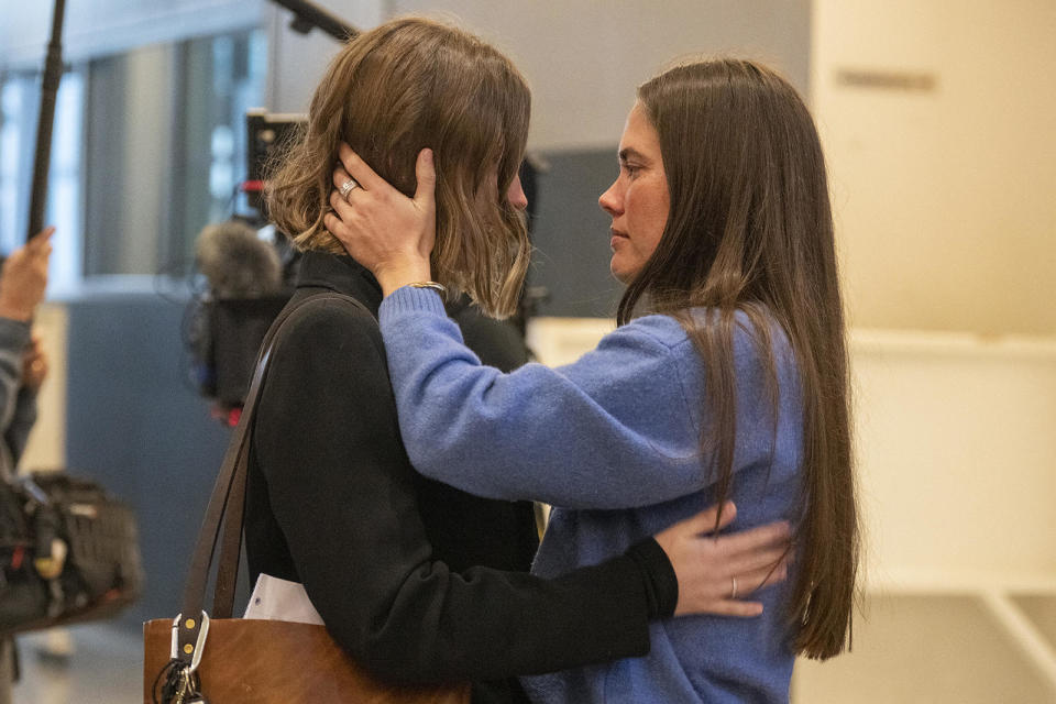 Caitlin Cash, right, is embraced during the first day of trial for State of Texas v. Kaitlin Armstrong at the Blackwell-Thurman Criminal Justice Center on Wednesday, Nov. 1, 2023, in Austin, Texas.  / Credit: Mikala Compton / AP