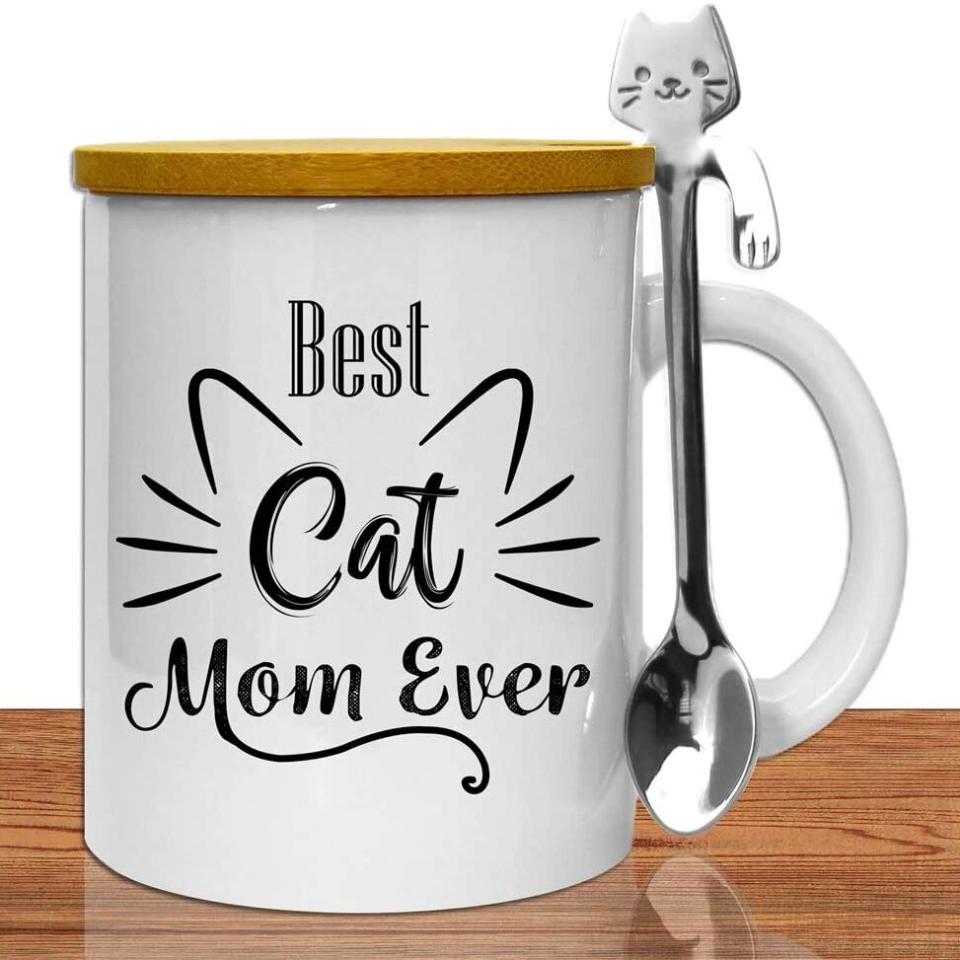 Product photo of a Best Cat Mom Ever With Lid and Spoon on a wooden surface with a white background