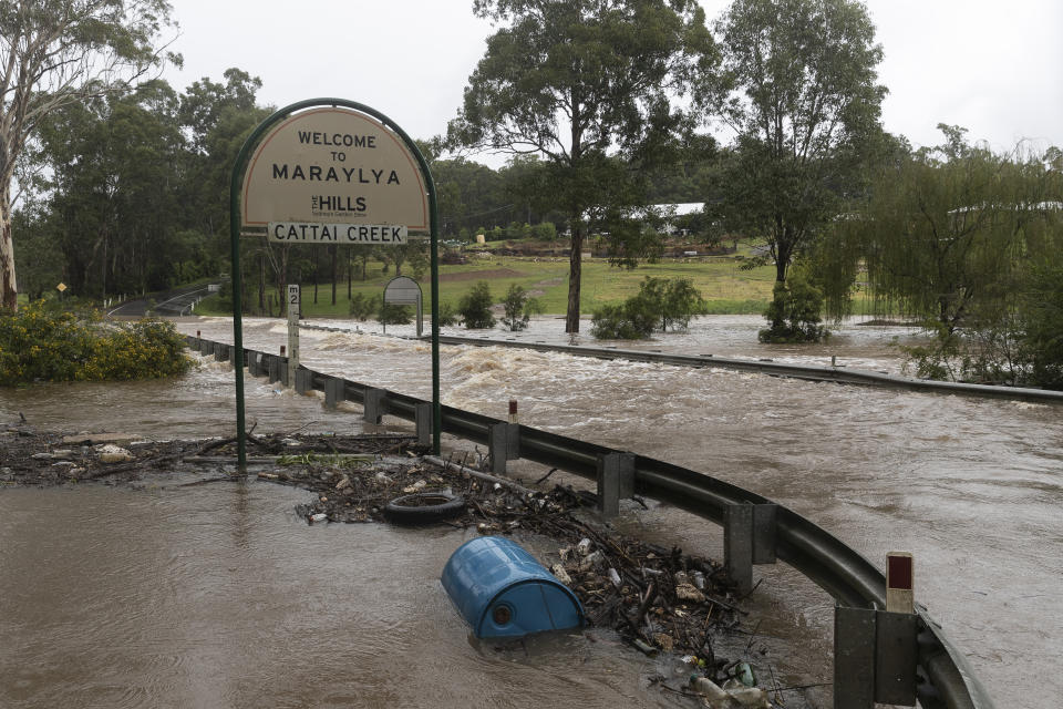 Heavy floodwaters cover a roadway at Cattai Creek on March 20, 2021 in Maraylya, Australia. Source: AAP