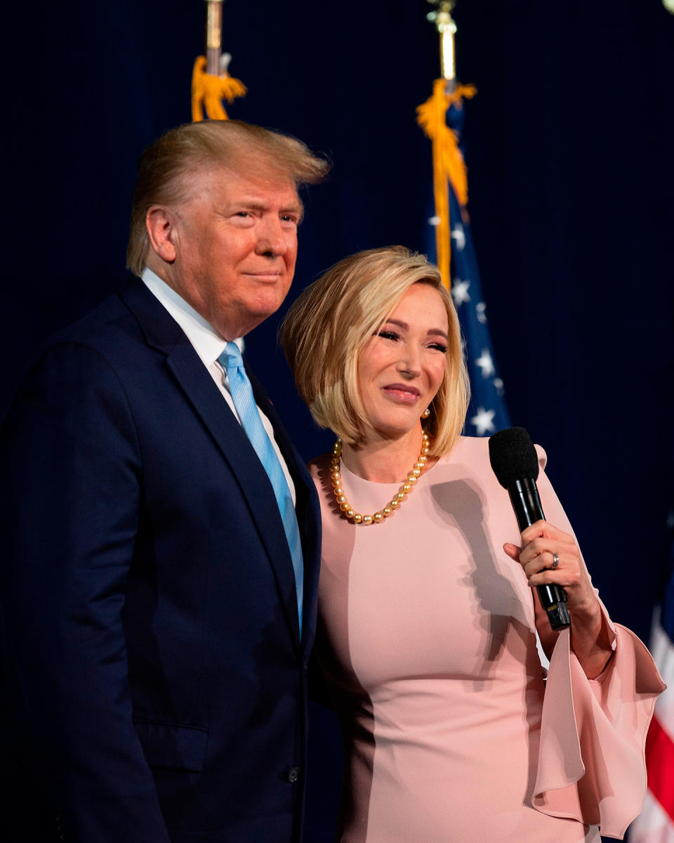 US President Donald Trump stands with Pastor Paula White during a 'Evangelicals for Trump' campaign event held at the King Jesus International Ministry on January 03, 2020 in Miami, Florida. (Photo by JIM WATSON / AFP) (Photo by JIM WATSON/AFP via Getty Images)