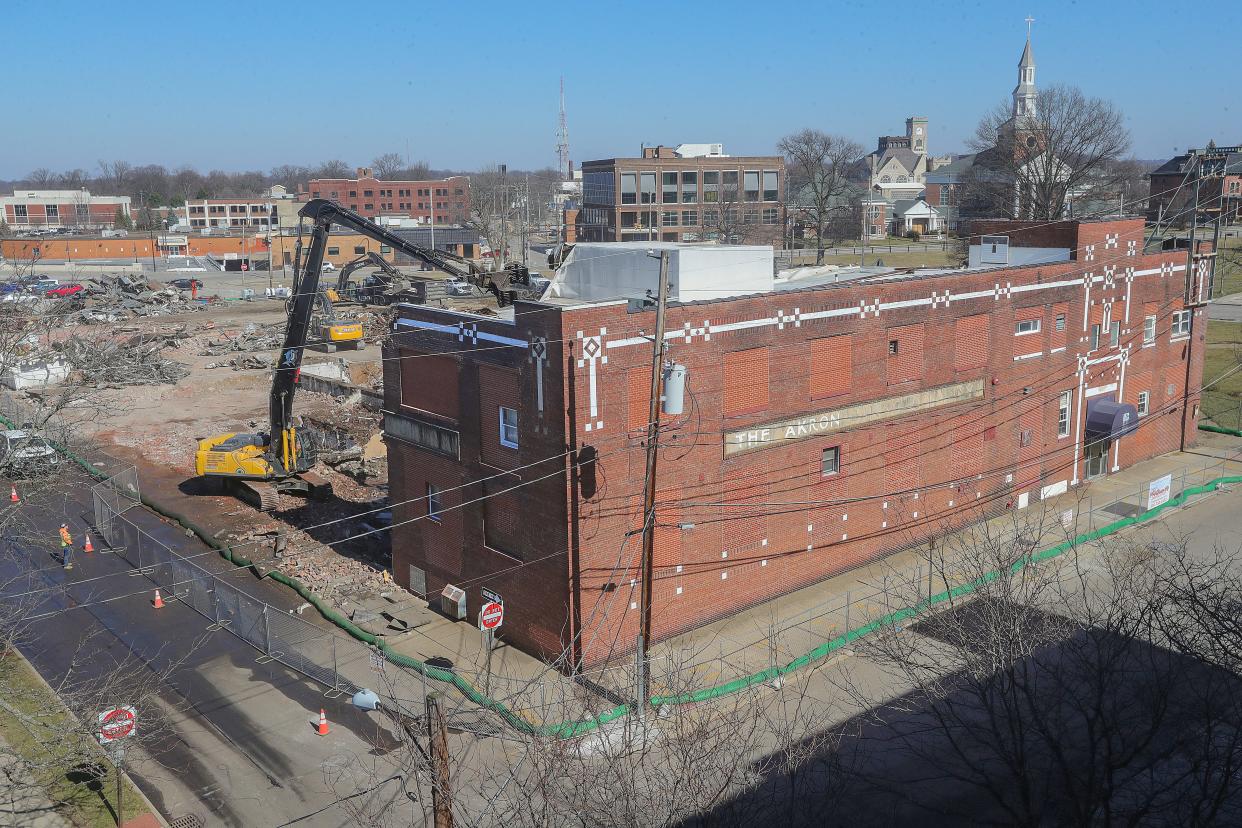 A crew from ProQuality Demolition of Youngstown tears down the former Wonder Bread and Continental Baking Co. plant at Forge and Lincoln streets at the University of Akron on Tuesday.
