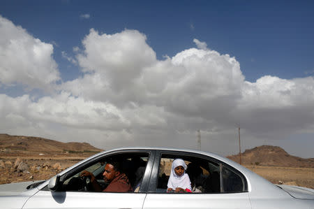 Afaf Hussein, 10, who is malnourished, looks from the window of a taxi during her trip back from treatment in Sanaa to her home village of al-Jaraib in the northwestern province of Hajjah, Yemen, February 16, 2019. Afaf, who now weighs around 11 kg and is described by her doctor as "skin and bones", has been left acutely malnourished by a limited diet during her growing years and suffering from hepatitis, likely caused by infected water. She left school two years ago because she got too weak. REUTERS/Khaled Abdullah