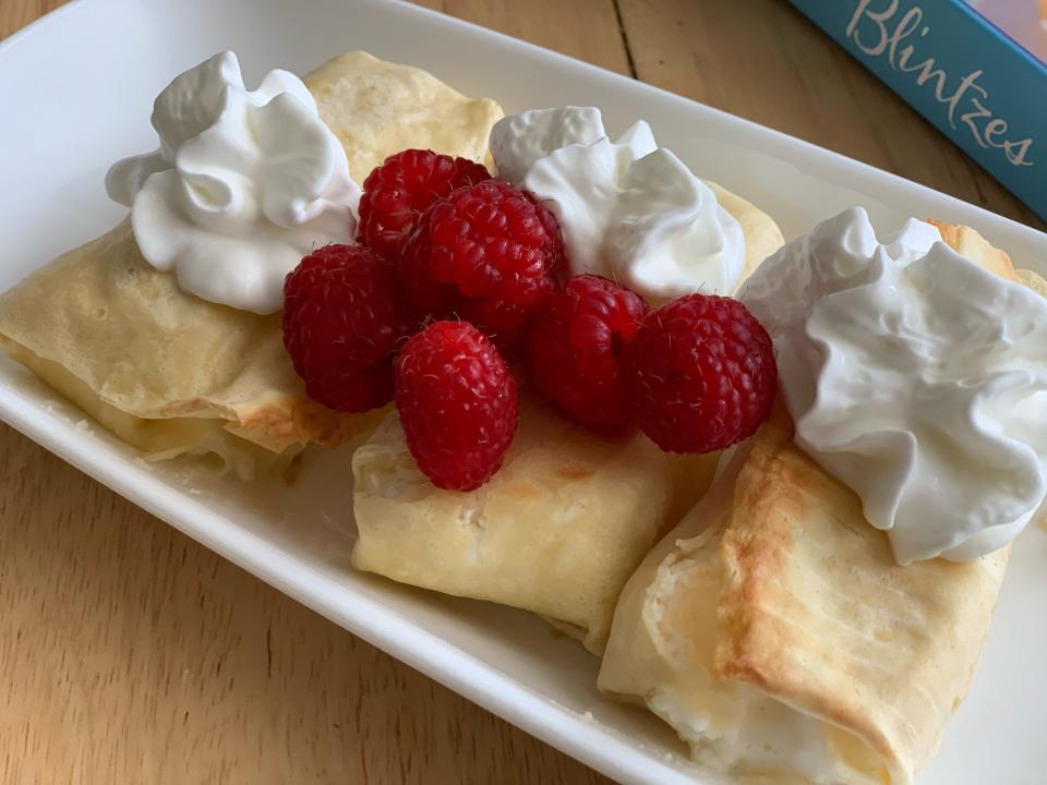 plate of garnished trader joe's blintzes