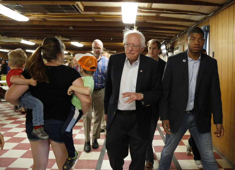 FILE - In this Sept. 3, 2019, file photo, Democratic presidential candidate Sen. Bernie Sanders, I-Vt., waves to potential supporters as he leaves a campaign event at the Circle 9 Ranch Campground Bingo Hall in Epsom, N.H. Sanders successfully turned his outsider credentials and call for political revolution into a commanding victory in the 2016 New Hampshire primary. But as he seeks a repeat performance, the Vermont senator could face unlikely competition. (AP Photo/Mary Schwalm, File)