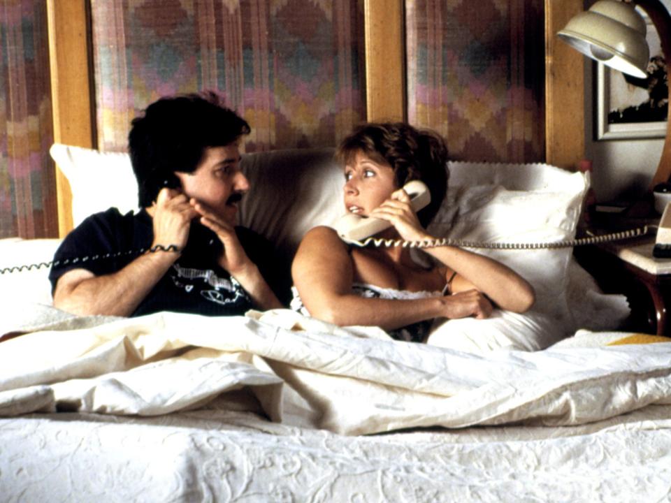 Carrie Fisher lounged in bed with Bruno Kirby during a scene for 1989's <em>When Harry Met Sally</em>.