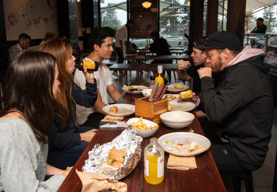 A group of people dining in at Macelleria Restaurant in Bondi Beach. Source: AAP