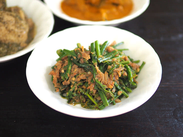 'Pucuk paku belacan' is a fragrant combination of fern tops fried with fermented prawn paste.