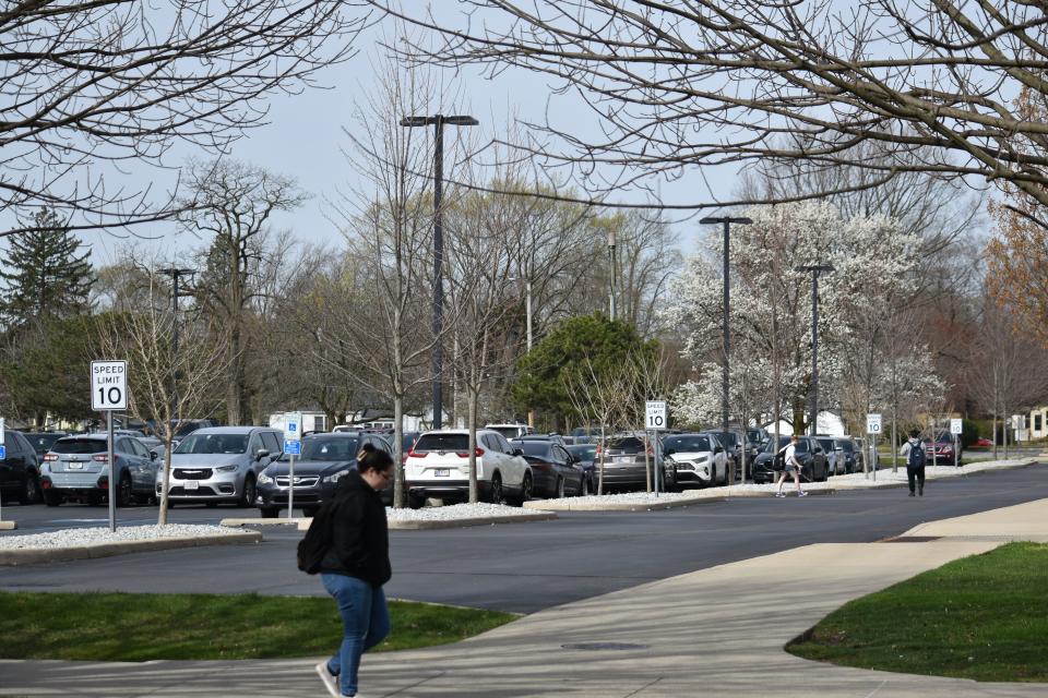 A parking lot near Indiana University South Bend's campus features parking lot islands filled with gravel instead of grass on Wednesday, April 10, 2024. Measurements show that grass islands result in lower carbon dioxide levels than gravel islands.