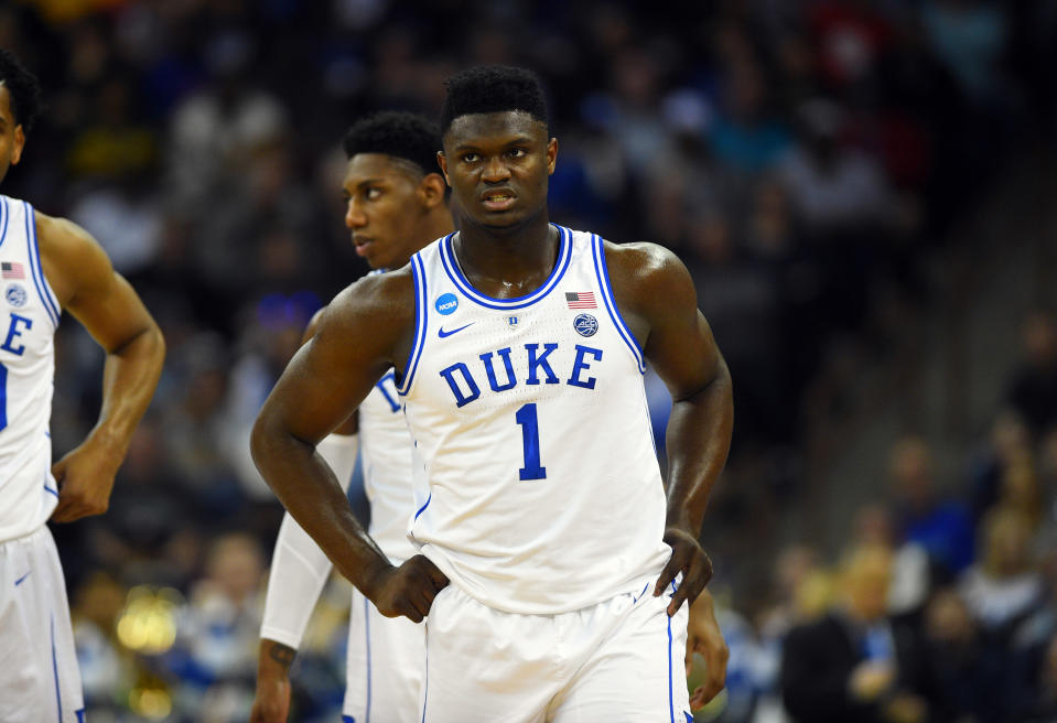 Duke Blue Devils forward Zion Williamson (1) looks on during the first half of an NCAA tournament game. (USAT)