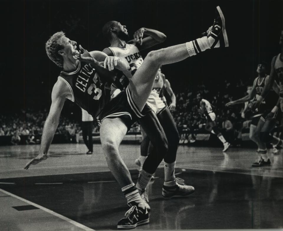 Boston's Larry Bird went to the floor with a little help from Milwaukee's Paul Pressey on May 15, 1987, in Game 6 of the Eastern Conference semifinals. The Bucks beat the Celtics, 121-111.