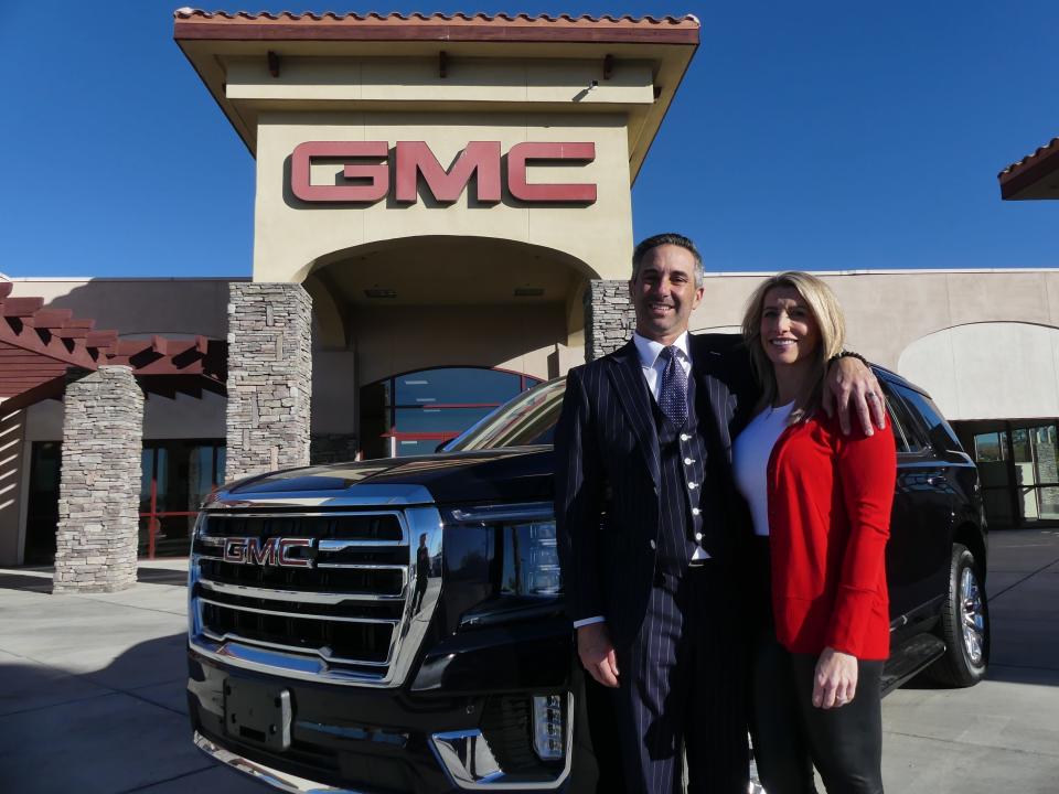 David Greiner, the owner/president of Greiner Buick GMC, and his soulmate, Missy Miranda, at the dealership in Victorville. Greiner said he sold the 35-year-old family business to Caposio Buick GMC.