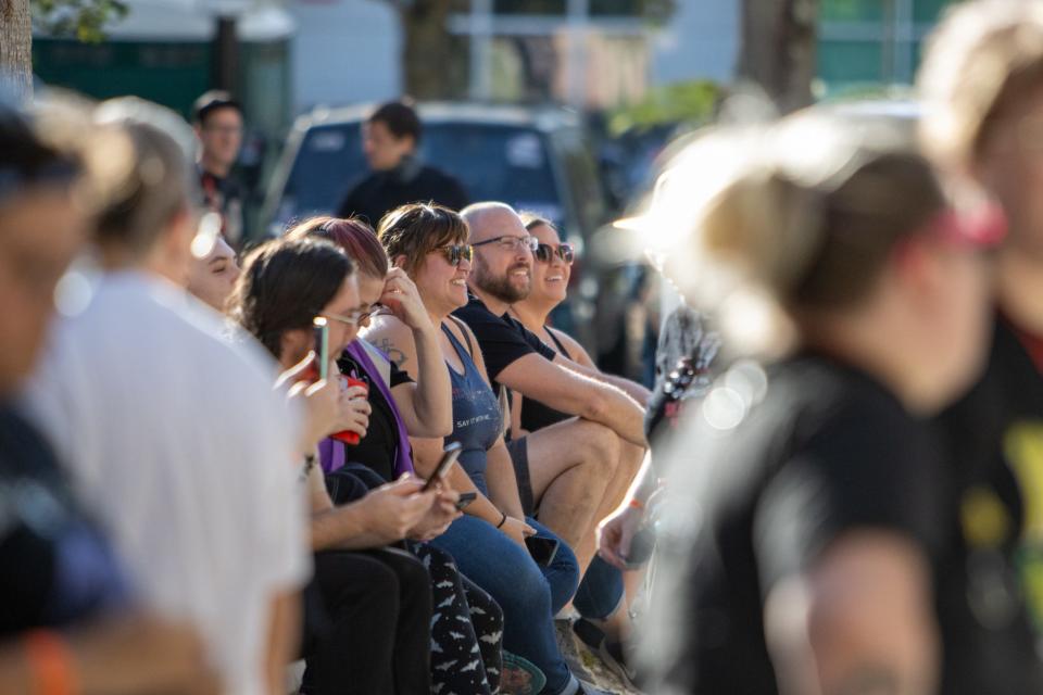 An audience looks on as Laura Jane Grace receives the key to the city on Oct. 27, 2023, in Gainesville, Fla.