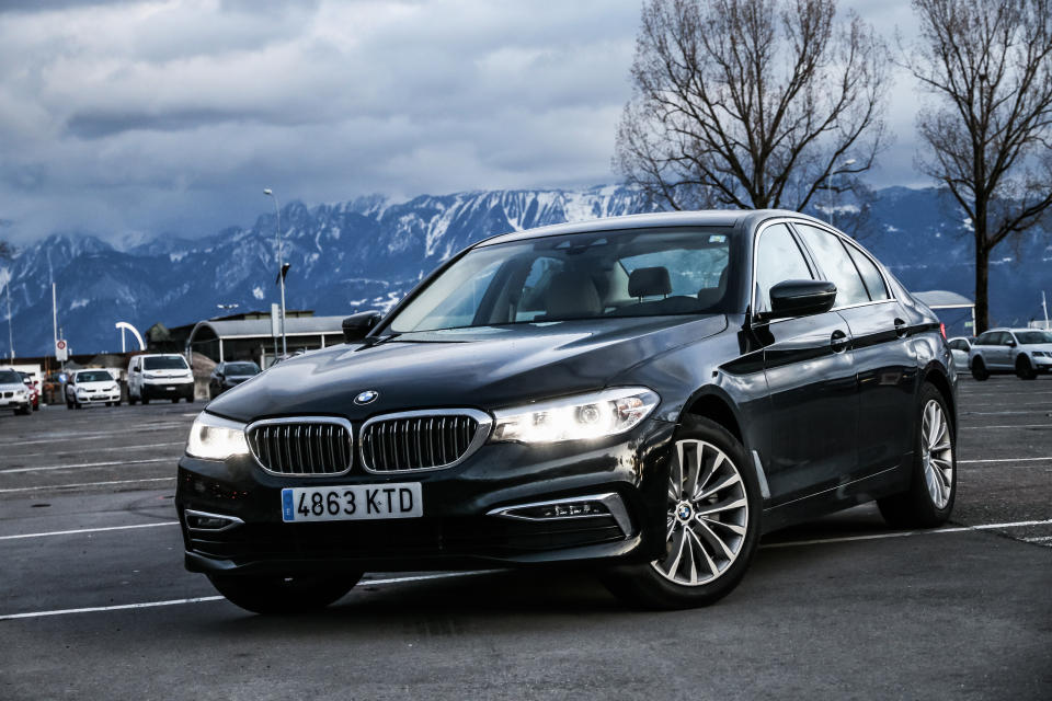 BMW 520d (G30) in the city street.