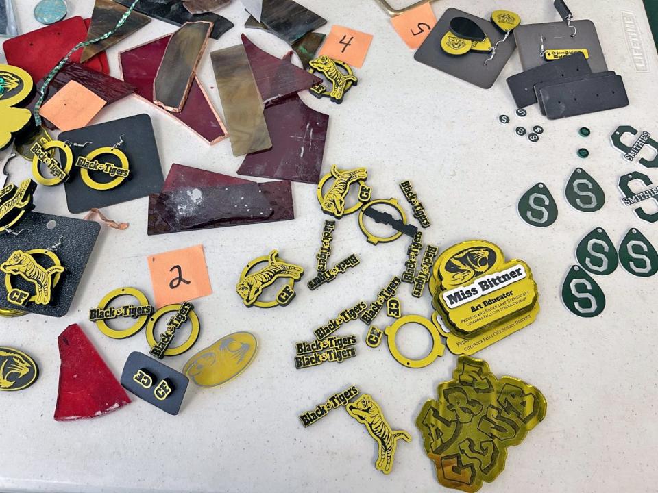 These earrings, name plates and other small trinkets were all made by the Smithie Art Club. Making and selling art is how art teacher Jennifer Winkler said her students have been able to keep the club running since it does not receive funding from the Green Local Schools district.
