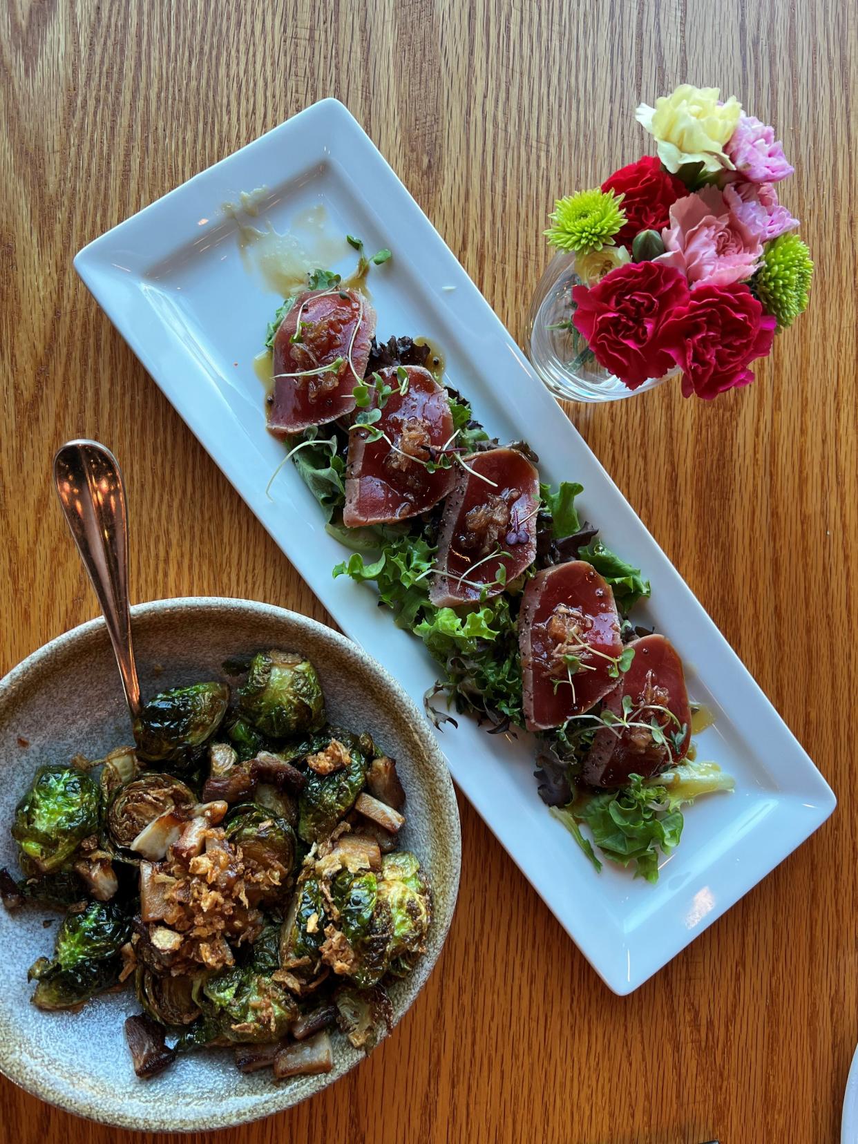 Always say yes to crispy Brussels sprouts, bottom, and seared tuna tataki at Wasabi in Ankeny.