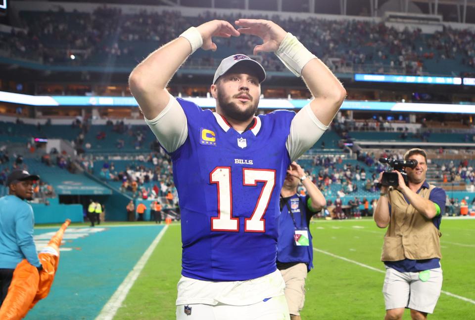 Josh Allen reacts to the crowd after a 21-14 victory against the Miami Dolphins at Hard Rock Stadium.