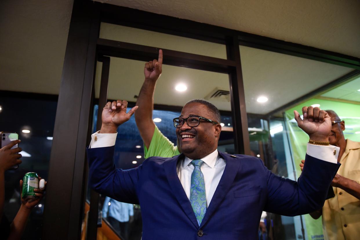 Mayor-elect Garnett Johnson cheers  at his campaign office as all precincts report the Augusta mayoral race on Tuesday, June 21, 2022.