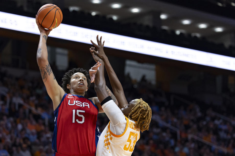 Team USA center Brittany Griner (15) looks to shoot over Tennessee forward Jillian Hollingshead (53) during the first half of an NCAA college basketball exhibition game, Sunday, Nov. 5, 2023, in Knoxville, Tenn. (AP Photo/Wade Payne)