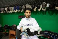 Wisam Sami, a 29 year-old Iraqi refugee, pauses during his wheelchair fencing training at Apostolos Nikolaidis stadium in Athens