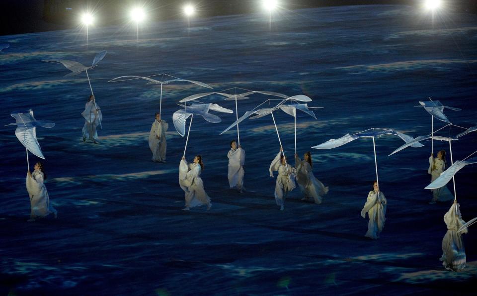 Performers take part in the Closing Ceremony of the Sochi Winter Olympics at the Fisht Olympic Stadium on February 23, 2014. AFP PHOTO / ANDREJ ISAKOVIC        (Photo credit should read ANDREJ ISAKOVIC/AFP/Getty Images)