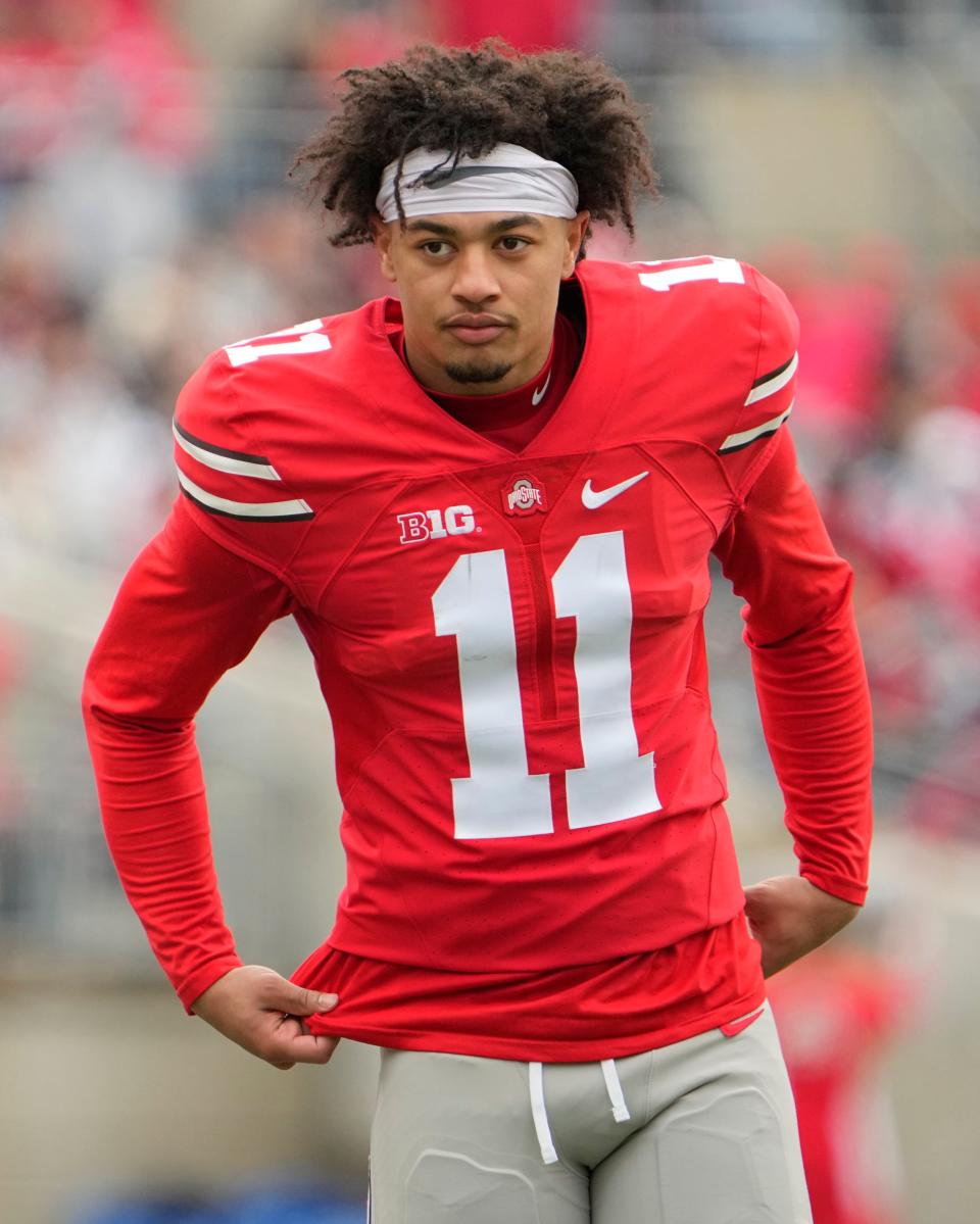 Ohio State receiver Jaxon Smith-Njigba will team with quarterback C.J. Stroud to promote Designer Shoe Warehouse.