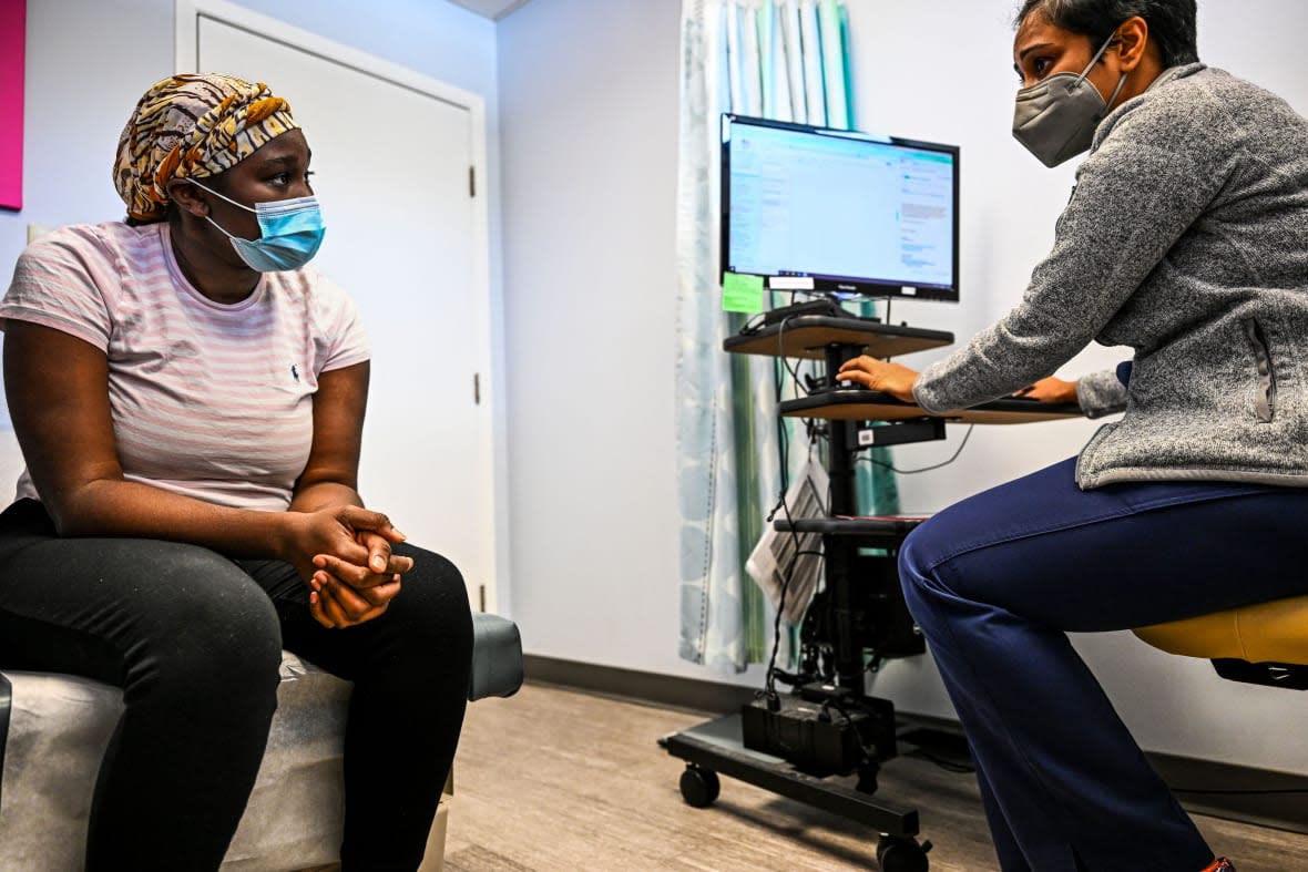 A woman, who chose to remain anonymous, talks to her doctor during an abortion consultation at a Planned Parenthood Abortion Clinic in Jacksonville, Florida, on July 20, 2022. (Photo by CHANDAN KHANNA / AFP) (Photo by CHANDAN KHANNA/AFP via Getty Images)