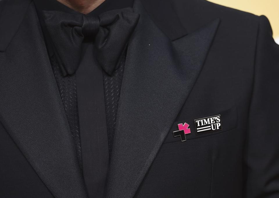 Edgar Ramirez wear’s a Time’s Up pin arrives at the 75th annual Golden Globe Awards - Credit: Jordan Strauss/Invision/AP