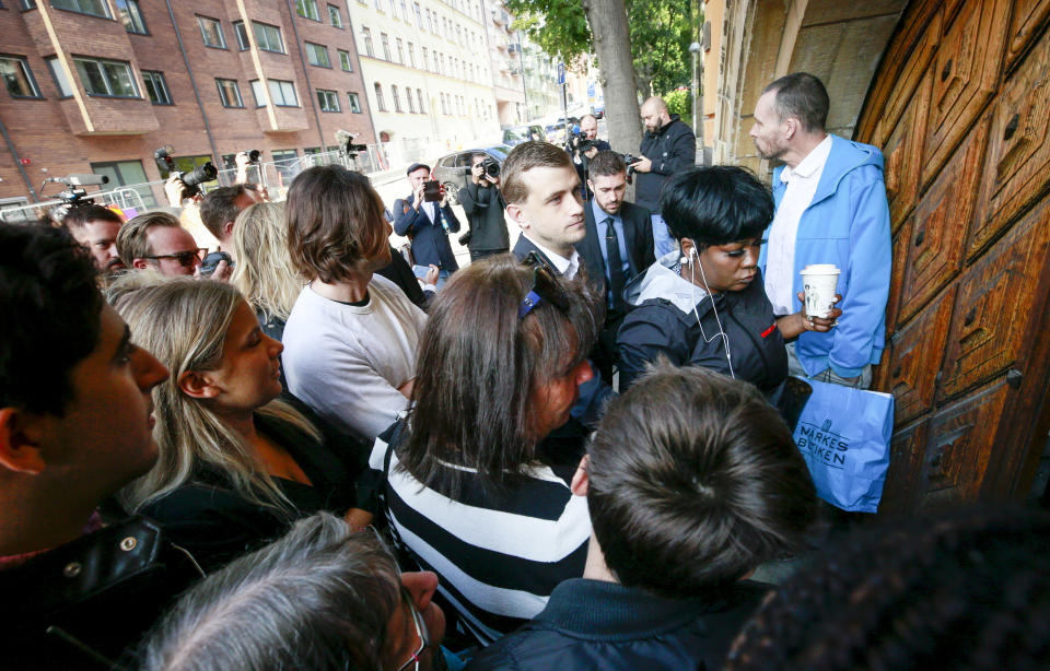 Renee Black, mother of ASAP Rocky, right, arrives at the district court in Stockholm, Thursday Aug. 1, 2019. American rapper A$AP Rocky pleaded not guilty to assault as his trial in Sweden opened Tuesday, a month after a street fight that landed him in jail and became a topic of U.S.-Swedish diplomacy. (Fredrik Persson/TT News Agency via AP)